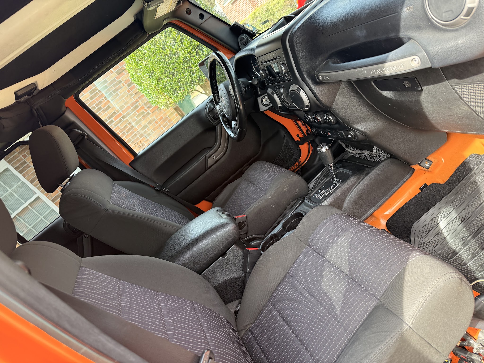 Orange Jeep interior after a full detail